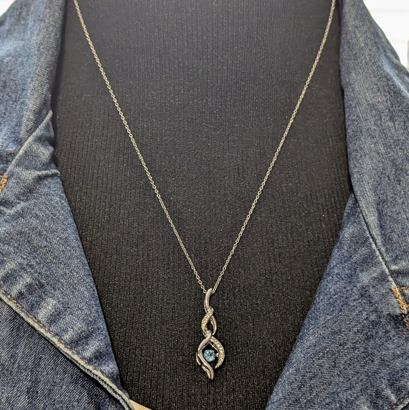 Sterling Silver Round Cut Sparkling Blue Topaz Infinity Pendant Necklace - Picture 3 of 9